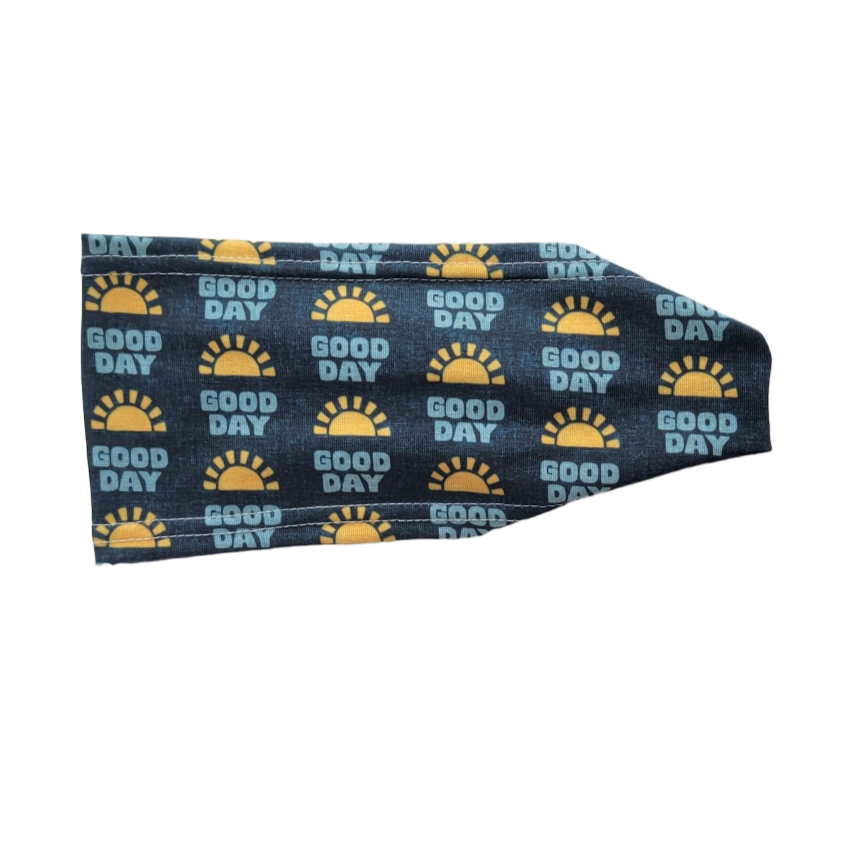 Headband with Yellow sunshines on blue with the words good day
