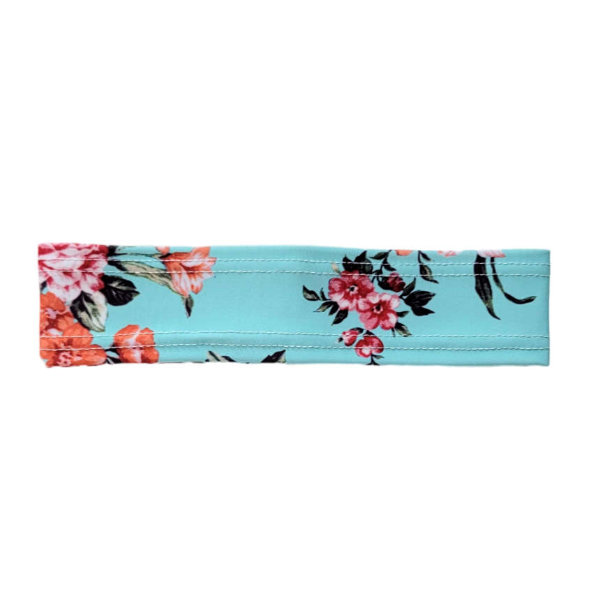 teal band with red and pink flowers