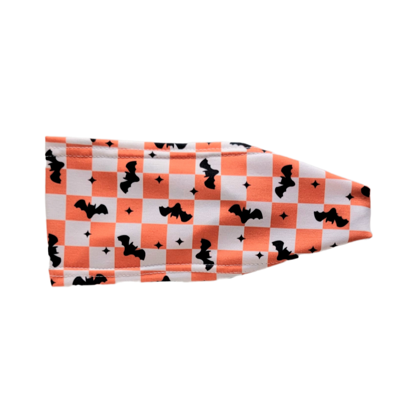 Headband with orange and white squares and blck bats