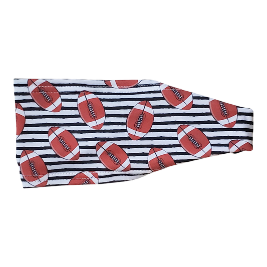 Headband with brown footballs on black and white stripes