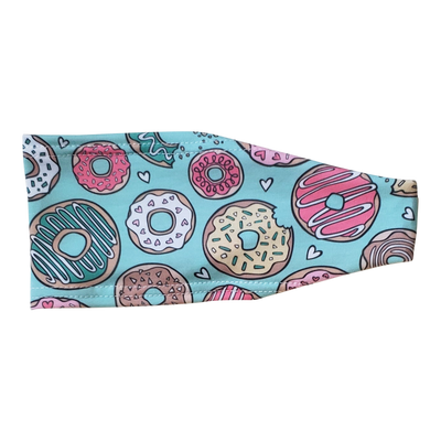 Headband with pink yellow and white donuts on teal