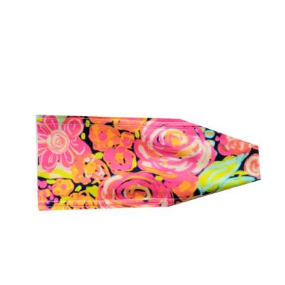 headband with bright neon orange pink and green flowers on navy