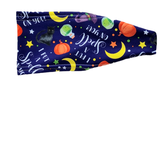 headband with halloween graphics multicolored i=on purple with white text