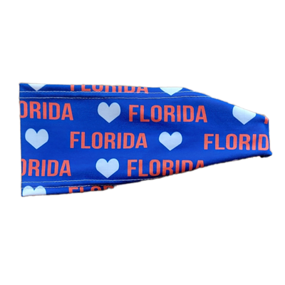 headband with orange florida text with white hearts on blue