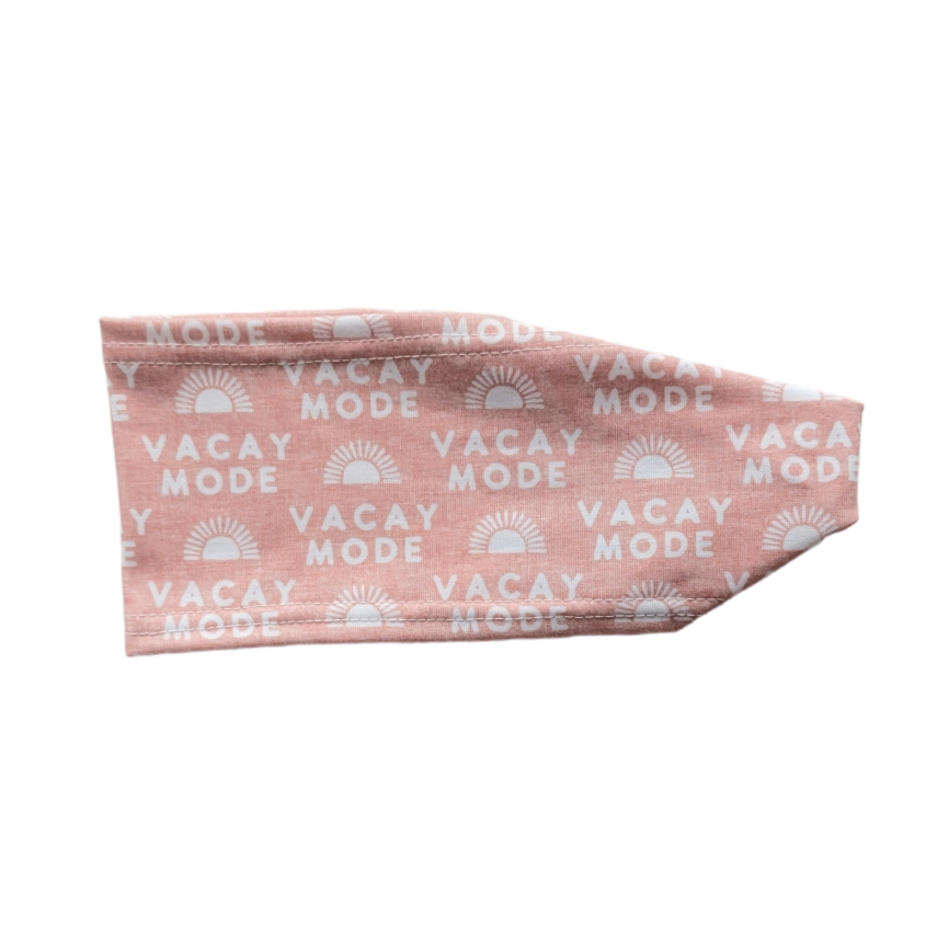 pink headband with white lettering