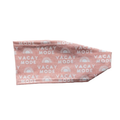 pink headband with white lettering