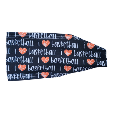headband with white text that says I love basketball with orange basketball heart on black
