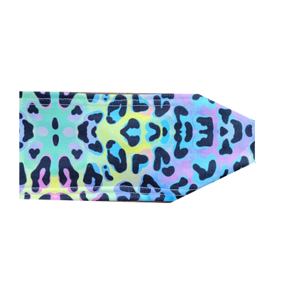 headband with black leopard sopts on neon colored background