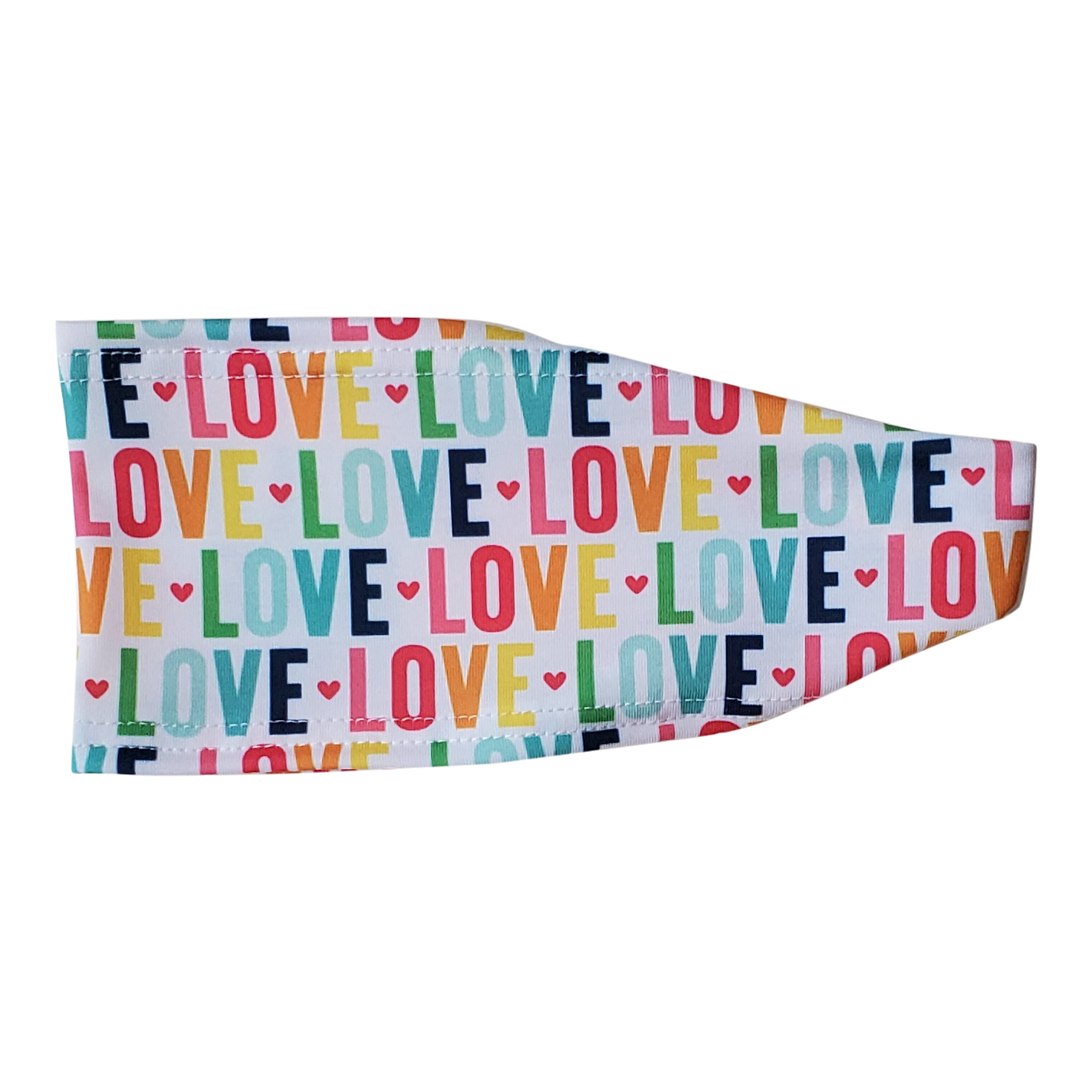 headband with rainbow colored repeated text that reads LOVE