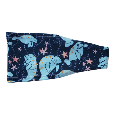 Headband with teal manatees pink stars on navy