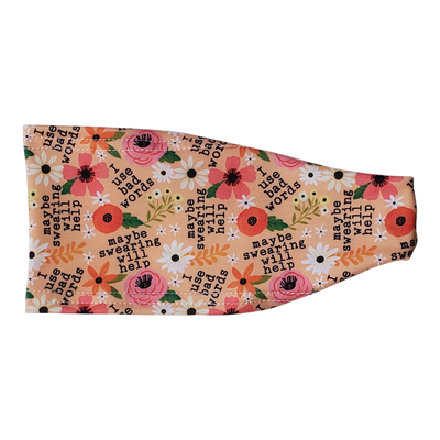 headband with pink and green flowers on peach with black text that reads I use bad words