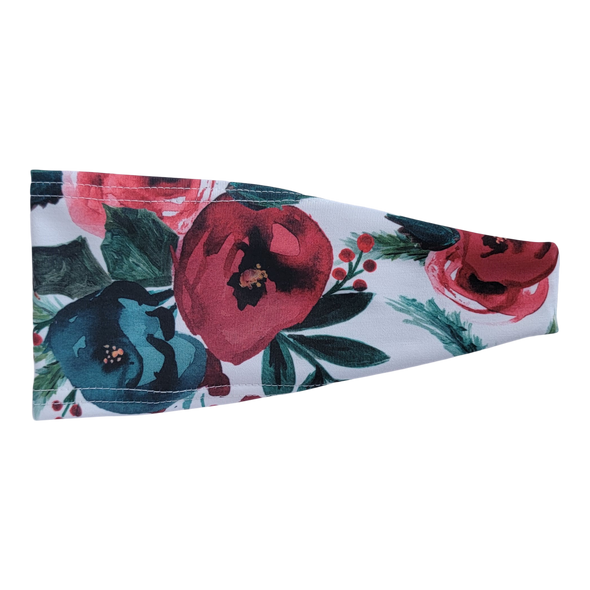 Headband with red and green christmas roses on white
